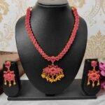 Unique Temple Design Ruby Stone Golden Balls Matte Finish Necklace and Earring Set