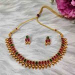 Unique Temple Design Ruby & Green Stone Golden Balls Matte Finish Necklace and Earring Set - Image 2