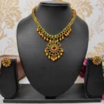 Unique Temple Design Ruby & Green Stone Golden Balls Matte Finish Necklace and Earring Set