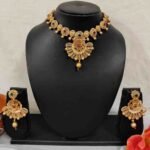 Flower and Leaf Design with Maroon , Grren Stone & Golden Ball Rajwadi Necklace and Earring Set