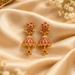 Ruby Red Floral American Diamond Jhumka Earrings – Gold-Plated Matte Finish | Swanky Diva SDE1112